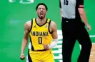  ?? ?? Pacers guard Tyrese Haliburton (0) reacts after his three-point basket against the Celtics in the third quarter on Tuesday night. Photograph: David Butler II/USA Today Sports