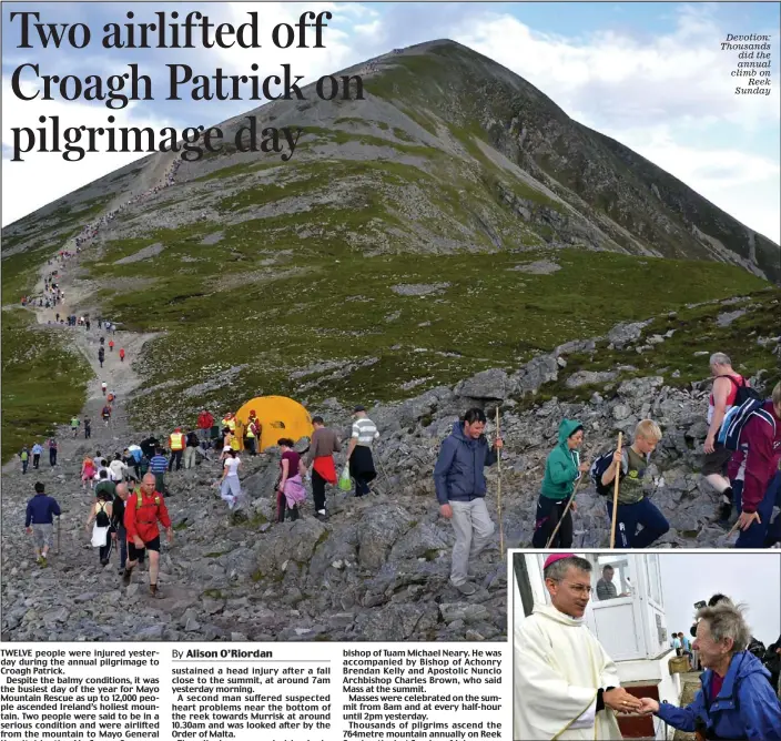  ??  ?? Devotion: Thousands did the annual climb on
Reek Sunday
Blessing: Archbishop Charles Brown meets a pilgrim