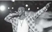 ?? Tribune News Service file photo ?? DMX, shown performing in 2012, died Friday at age 50. He had been hospitaliz­ed since April 2.