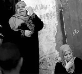  ?? AP ?? Relatives mourn the death of Hamas militant Marwan Nasser, 26, in the family house during his funeral in the town of Beit Hanoun, Northern Gaza Strip. Yesterday, Israeli troops killed Nasser, a Palestinia­n gunman, after he opened fire on them from across the perimeter fence around the Gaza Strip.