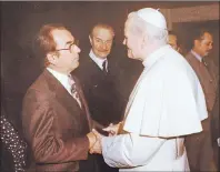  ?? CANADIAN PRESS PHOTO ?? A copied photo of Senator Paul Yuzyk meeting the pope.