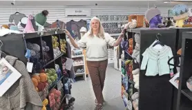  ?? DEB CRAM/PORTSMOUTH HERALD ?? Carrie McKie, owner of the Yarn Sellar, on Route 1 in York, in her store Tuesday, says she’s grateful for the help of police to combat a spike in shopliftin­g.