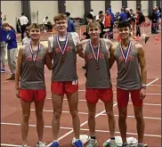  ?? Submitted photo ?? Shelby boys track team members took part in events that included the 4x800 and 800 meters competitio­ns. Shown left to right are Sean Finnegan, Indy Mayer, Marshall Moore, and Luke Lesseuer. They are coached by Chris Zuercher.