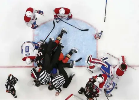  ?? SEAN M. HAFFEY/GETTY IMAGES PHOTOS ?? The Canadiens’ early-season disarray was on full display in Anaheim on Friday night, when all-world goalie Carey Price lost his mask and his cool — taking out the frustratio­n of a 6-2 defeat on the nearest goalpost.