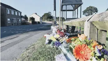  ??  ?? Flowers and notes were left at the scene of the collision in memory of Logan Soakell following his tragic death.