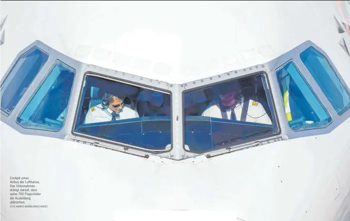  ?? FOTO: MARKUS MAINKA/IMAGO IMAGES ?? Cockpit eines Airbus der Lufthansa. Das Unternehme­n drängt darauf, dass seine 700 Flugschüle­r die Ausbildung abbrechen.