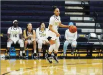  ?? Appeal-democrat ?? Yuba’s Lailani Hanks dribbles down court during a game on Jan. 31 against Merritt College at the Yuba College gym in Linda.