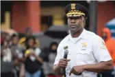  ??  ?? CPD 7th District Cmdr. Larry Snelling speaks Monday evening during Operation Wake-Up, intended to show “that gun violence will not be tolerated,” at West 61st and South Halsted streets in Englewood.