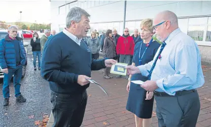  ?? Picture: Paul Reid. ?? A protest at Angus House council HQ got the message over loud and clear.