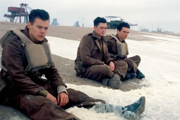  ??  ?? This image released by Warner Bros. Pictures shows Harry Styles, from left, Aneurin Barnard and Fionn Whitehead in a scene from Dunkirk