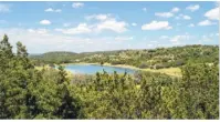  ??  ?? At Eagle Ridge, buyers can get their wooded, 10-acre, lakeaccess estate with Hill Country and lake views, on sale, for $179,900.