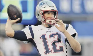  ?? Bill Kostroun / Associated Press ?? Tom Brady’s last-minute touchdown pass rallied the Patriots past Houston last season 36-33. Brady, last season’s league MVP, is 8-1 vs. the Texans in his career.