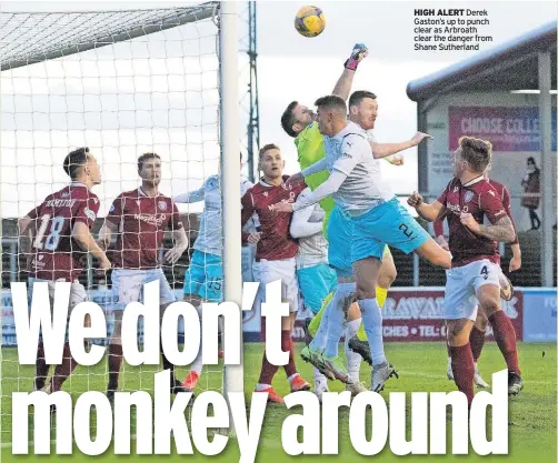  ?? ?? HIGH ALERT Derek Gaston’s up to punch clear as Arbroath clear the danger from Shane Sutherland