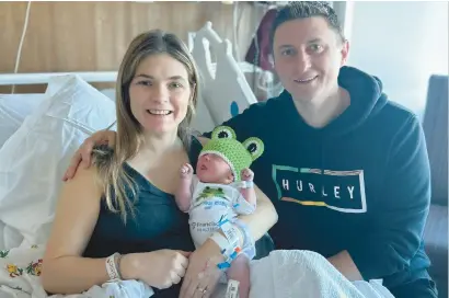  ?? FRANCISCAN HEALTH ?? Carly and Matt Dobin, of DeMotte, Ind., welcomed a daughter, Molly, on Leap Day, Feb. 29, at Franciscan Health in Crown Point.