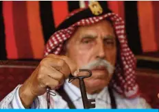  ?? — AFP ?? Palestinia­n refugee Mahmoud Abu Deeb, 82, a former fighter from Beersheba, holds a key at his home in Khan Yunis in the southern of Gaza Strip on May 14, 2020, as he marks the 72nd anniversar­y of the Nakba while at home due to the COVID-19 pandemic.