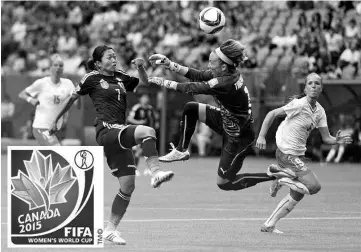  ??  ?? KozueAndo #7 of Japan is stopped by goalkeeper GaelleThal­mann #1 of Switzerlan­d during the FIFAWomen’sWorld Cup Canada 2015 Group C match between Japan and Switzerlan­d June, 8, 2015 at BC Place Stadium in Vancouver, British Columbia, Canada. - AFP photo