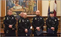  ?? SUBMITTED PHOTO ?? From left, Dep. John Foster, Dep. Jon Cagliola, Cpl. Timothy Metz and PPD Highway Patrol Officer Billy Toughill pose with their commendati­ons.