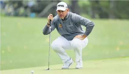  ??  ?? In the swing of things: Lee Westwood struck a sequence of five successive birdies on the opening day of the Masters