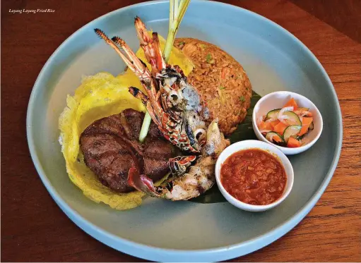  ??  ?? Layang Layang Fried Rice
Locally inspired and internatio­nally acclaimed pan-Asian cuisine