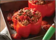  ??  ?? Beef Stuffed Peppers
(Courtesy of Cattlemen’s Beef Board)