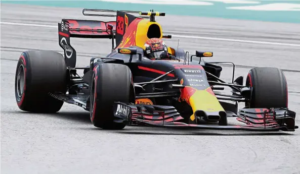  ??  ?? Feeling the heat: Red Bull’s Max Verstappen in action during qualifying at the Malaysia Grand Prix yesterday. The Ducth driver is hoping for rain during the race today.