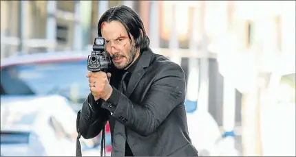  ??  ?? IN THE FIRING LINE: Keanu Reeves resurrects his role as John Wick in the film ‘John Wick: Chapter 2’, which opens in East London tomorrow