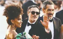  ?? GETTY IMAGES ?? Zazie Beetz, left, Joaquin Phoenix and Todd Phillips attended the première of Joker at the 76th Venice Film Festival over the weekend.