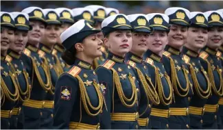  ?? ?? Russian servicewom­en march during the Victory Day military parade in Moscow, Russia, Thursday, May 9, 2024.