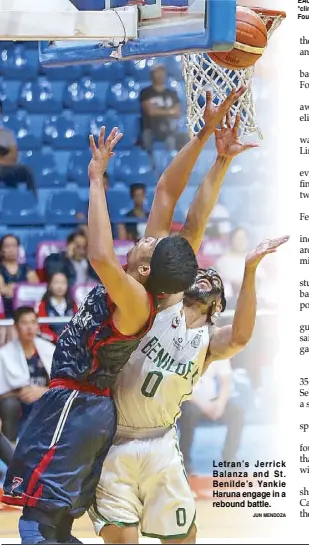  ?? JUN MENDOZA ?? Letran’s Jerrick Balanza and St. Benilde’s Yankie Haruna engage in a rebound battle.