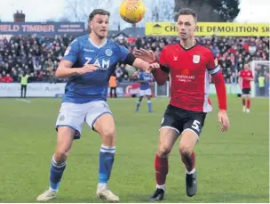  ?? Chelsie Wilson ?? Harry Smith looks to force his way past the Crewe defence