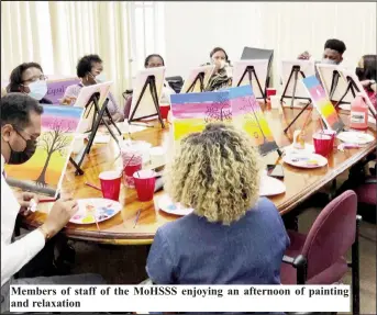  ??  ?? Members of staff of the MoHSSS enjoying an afternoon of painting and relaxation