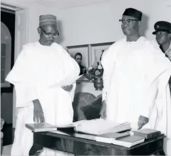  ??  ?? Governor General of Nigeria, Dr. Nnamdi Azikiwe, swearing in Sir Abubakar Tafawa Balewa as Prime Minister of Nigeria at independen­ce in 1960