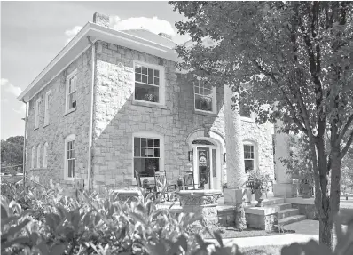  ?? Photo courtesy of Tay Whiteside/Black Dog Salvage ?? ■ The exterior of the Stone House, which was built with rock left over from projects around Roanoke, Va.