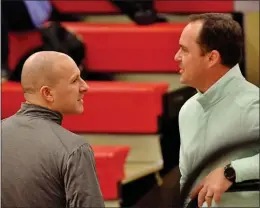  ?? KYLE FRANKO — TRENTONIAN PHOTO ?? Hightstown athletic director Jim Peto, right, talks with Trenton girls soccer coach Anthony Carsella, left, during a CVC game in 2020. Peto passed away at age 42on Thursday.