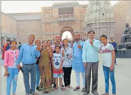  ?? ?? People visit Kashi Vishwanath temple after casting their votes in Varanasi on Monday.