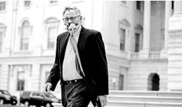  ?? ANNA MONEYMAKER/THE NEW YORK TIMES ?? Sen. Richard Burr, R-N.C., departs the Capitol on Thursday, a day after his cellphone was seized in an FBI investigat­ion. Barr stepped down as chair of the Senate intelligen­ce panel.