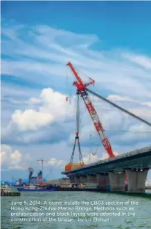  ??  ?? June 5, 2014: A crane installs the CB03 section of the Hong Kong-zhuhai-macao Bridge. Methods such as prefabrica­tion and block laying were adopted in the constructi­on of the bridge. by Lu Zhihua