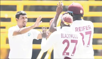  ?? ?? Gudakesh Motie celebrates one of his three wickets on yesterday’s opening day (Photo Courtesy Twitter)