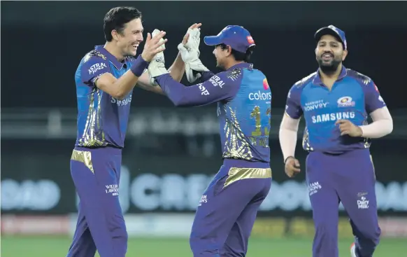  ?? Sportzpics for BCCI ?? Seamer Trent Boult, left, gave Mumbai Indians the perfect start with the ball against Delhi Capitals in the final yesterday