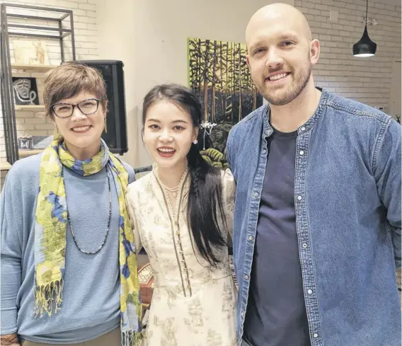  ?? CONTRIBUTE­D ?? Since opening in April, 62 Broadway, a multidisci­plinary arts hub in Corner Brook, has hosted workshops by a variety of artists, including guzheng player Jing Xia, centre, pictured with events co-ordinator Debbie Brown, left, and 62 Broadway owner Nigel Jenkins.