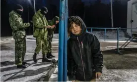  ?? ?? A girl from Syria at the warehouse in Bruzgi, Belarus. Photograph: Alessio Mamo/The Guardian