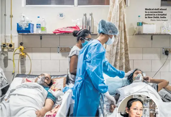  ?? Photo / Getty Images) ?? Medical staff attend to a coronaviru­s patient in a hospital in New Delhi, India.