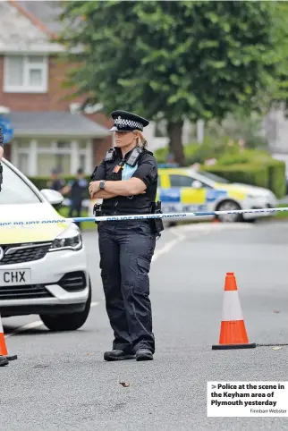  ?? Finnbarr Webster ?? Police at the scene in the Keyham area of Plymouth yesterday