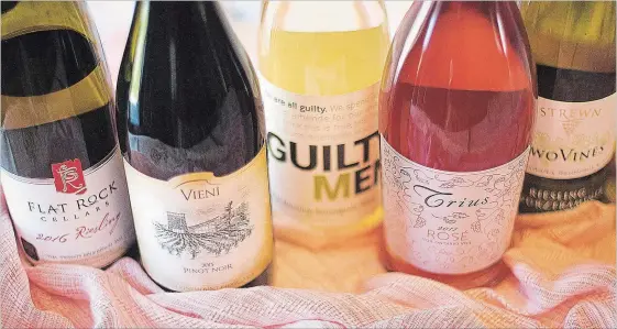  ?? BOB TYMCZYSZYN THE ST. CATHARINES STANDARD ?? A selection of Niagara wines to celebrate Mother’s Day with. Flat Rock Cellars 2016 Riesling, Vieni 2015 Pinot Noir, Malivoire Guilty Men, Trius Rose 2017 and Strewn Riesling/Gewurztram­iner.