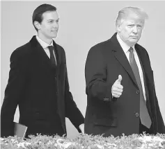  ??  ?? Trump gives a thumbs-up as he and Kushner depart the White House in this file photo. — Reuters photo