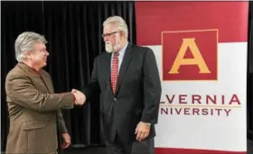  ?? PHOTO COURTESY MATTHEW WRIGHT ?? Alvernia University has joined Montgomery County Community College’s University Center and will offer two advanced degrees college’s west campus in Pottstown — a Master of Business and a Master in Education. Shown here during a ceremony at MCCC June 5...