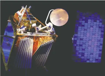  ?? REGIS DUVIGNAU/REUTERS FILES ?? A model of a Oneweb satellite. Ottawa-based Telesat says unlike rivals like Oneweb, it has more powerful satellites offering high-speed internet from space. But there are doubts about demand.