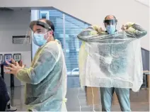  ?? TIM KROCHAK • THE CHRONICLE HERALD ?? Technician­s prepare to conduct free COVID-19 testing at a pop-up testing site in Halifax. There has been strong interest in the province's pop-up testing program, Premier Stephen Mcneil said Monday.