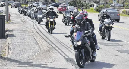  ?? CODY MCEACHERN   TRURO DAILY NEWS ?? After their ride, a long stream of bikers poured into the Bellyup parking lot to enjoy an afternoon of live music, food and a silent auction held to raise money for BACA.