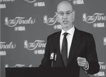  ??  ?? Commission­er Adam Silver says the NBA season, assuming it resumes, could stretch as late as August. It appears unlikely that the regular season will stretch to its scheduled 82 games after the league suspended play last week because of concerns about the coronaviru­s outbreak.
